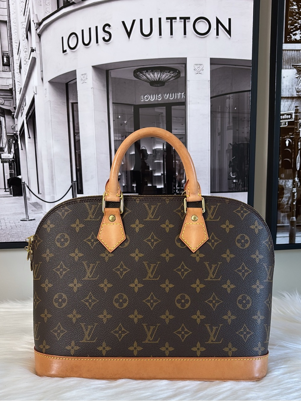 Louis Vuitton Monogram Alma Satchel in Brown and Tan